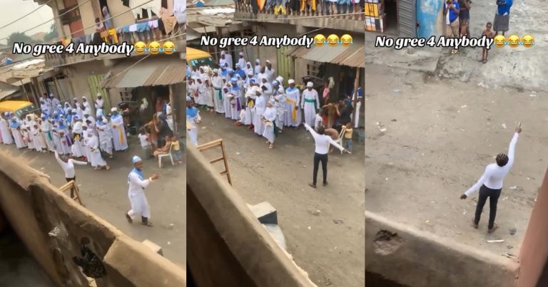 "No gree for anybody"– Woman mimics white garment pastor's actions during street prayers (WATCH)