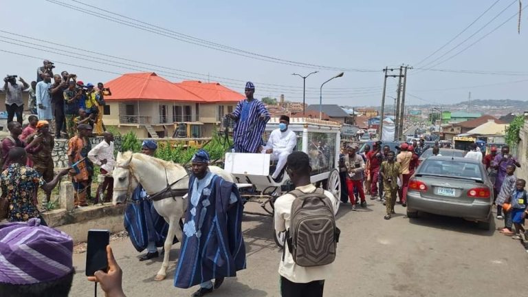 Late Olubadan Lekan Balogun in a horse chariot X A Ayofe