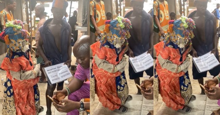 "Araorun dey collect transfer" – Viral Video of Masquerade collecting money transfer (WATCH)