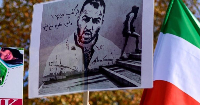 Iran top court overturns rapper's death sentencerator