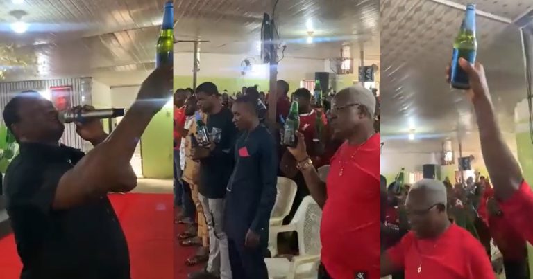 "They are lifting their trophies to God" – Moment a pastor and his congregation were seen holding a bottle of beer while praying in church (VIDEO)