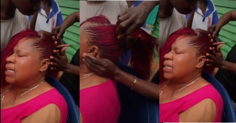 "Na by force?" – Netizens react as woman wr!the in p@in while making a million braids hair (WATCH)