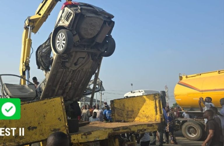 LASTMA rescues driver as 40-foot container falls on Toyota Camry