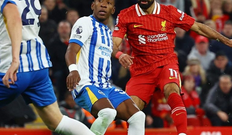 Salah strike beats Brighton to take Liverpool top