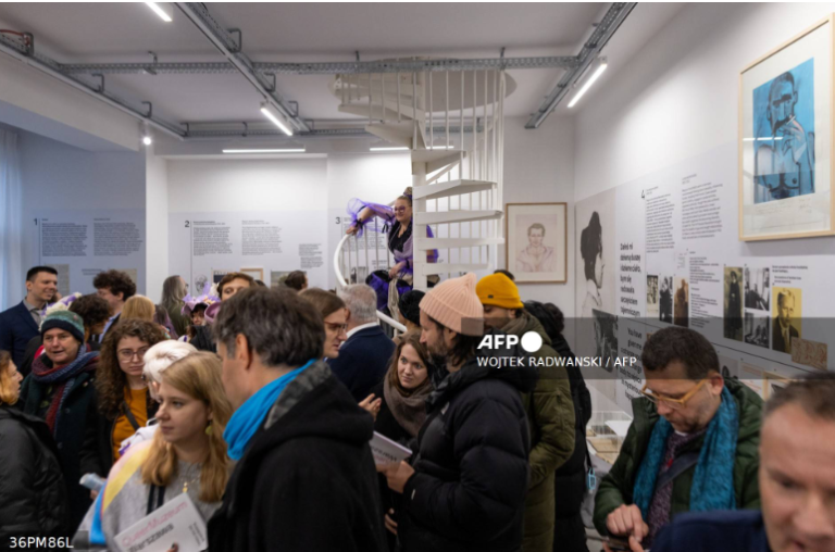 People gather at the opening of Poland’s first Queer Museum in Warsaw on December 6, 2024 (Photo by Wojtek RADWANSKI / AFP)