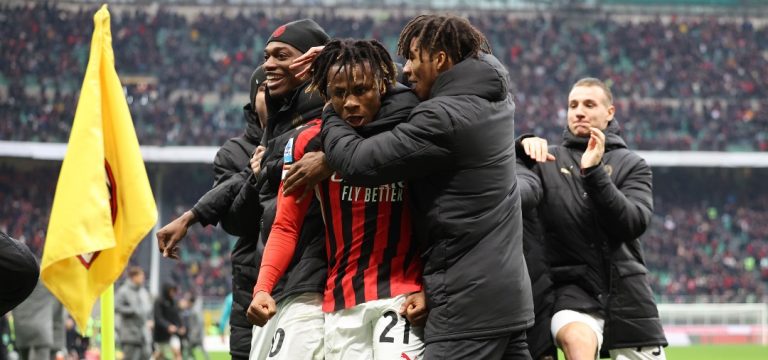 Teammates celebrate with Chukwueze