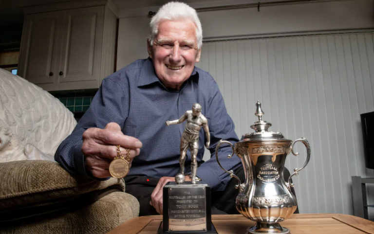 Book with his FA Cup winner’s medal and his Footballer of the Year award from 1969 Credit: PAUL COOPER