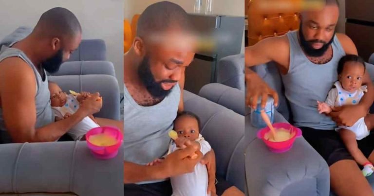 "Who is feeding whom?" – Toddler refuses to eat and holds onto the spoon after dad attempts to feed her without adding milk to the pap (WATCH)