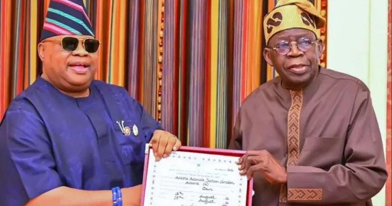 PHOTOS: Adeleke presents return certificate to Tinubu