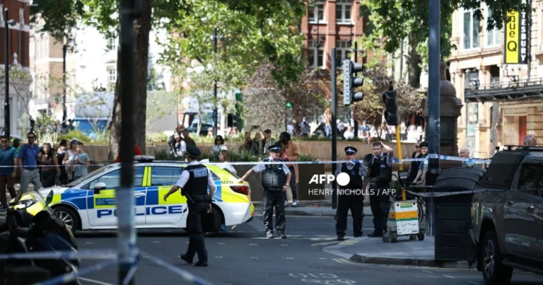 Woman arrested after stabbing four men in London