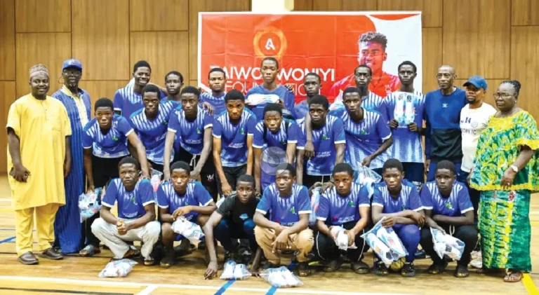 Awoniyi donates boots to 350 Kwara youngsters