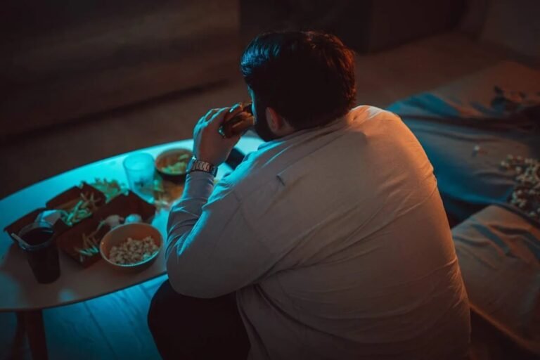 Man eating at night